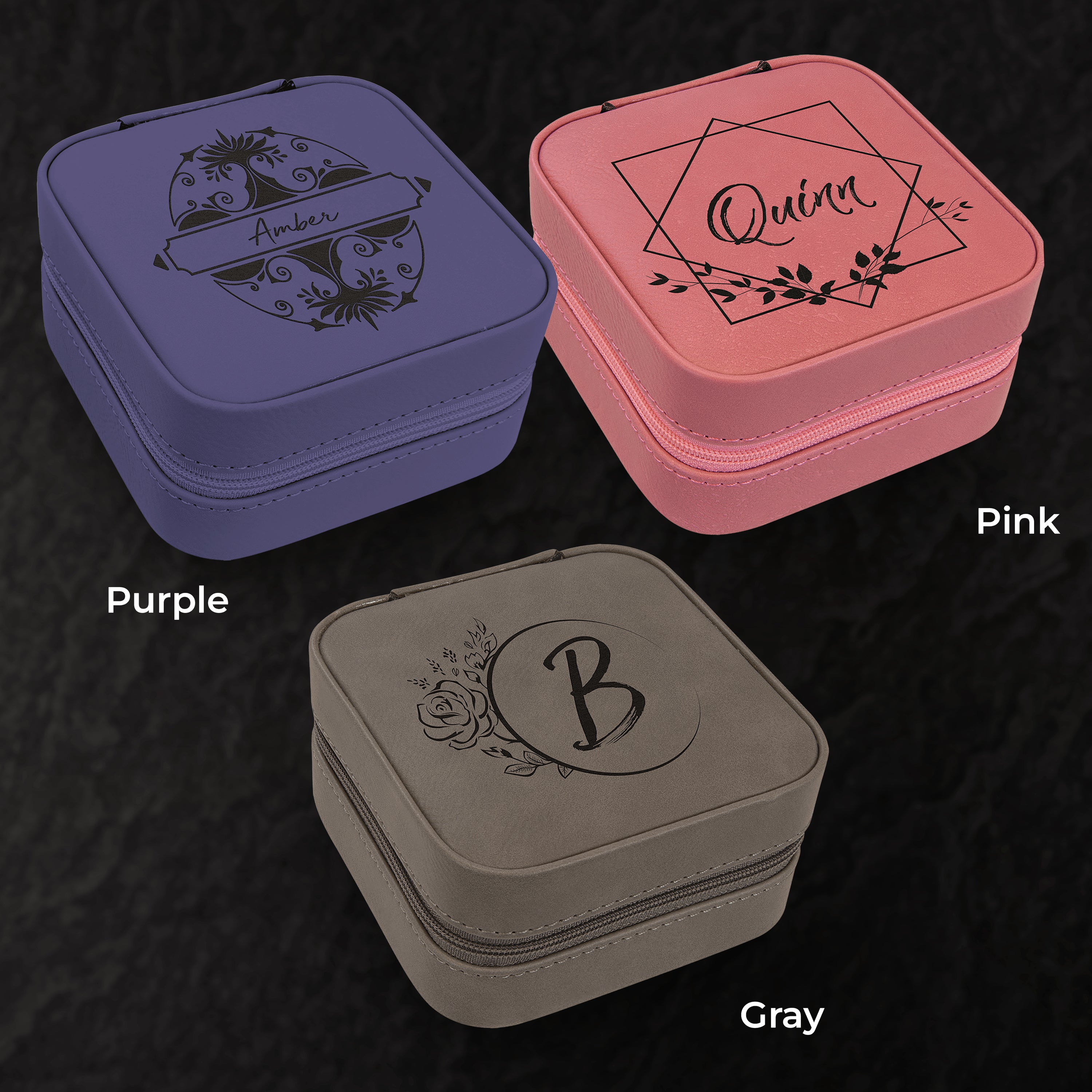 Three jewelry boxes in purple, pink, and gray with personalized designs on a dark background.