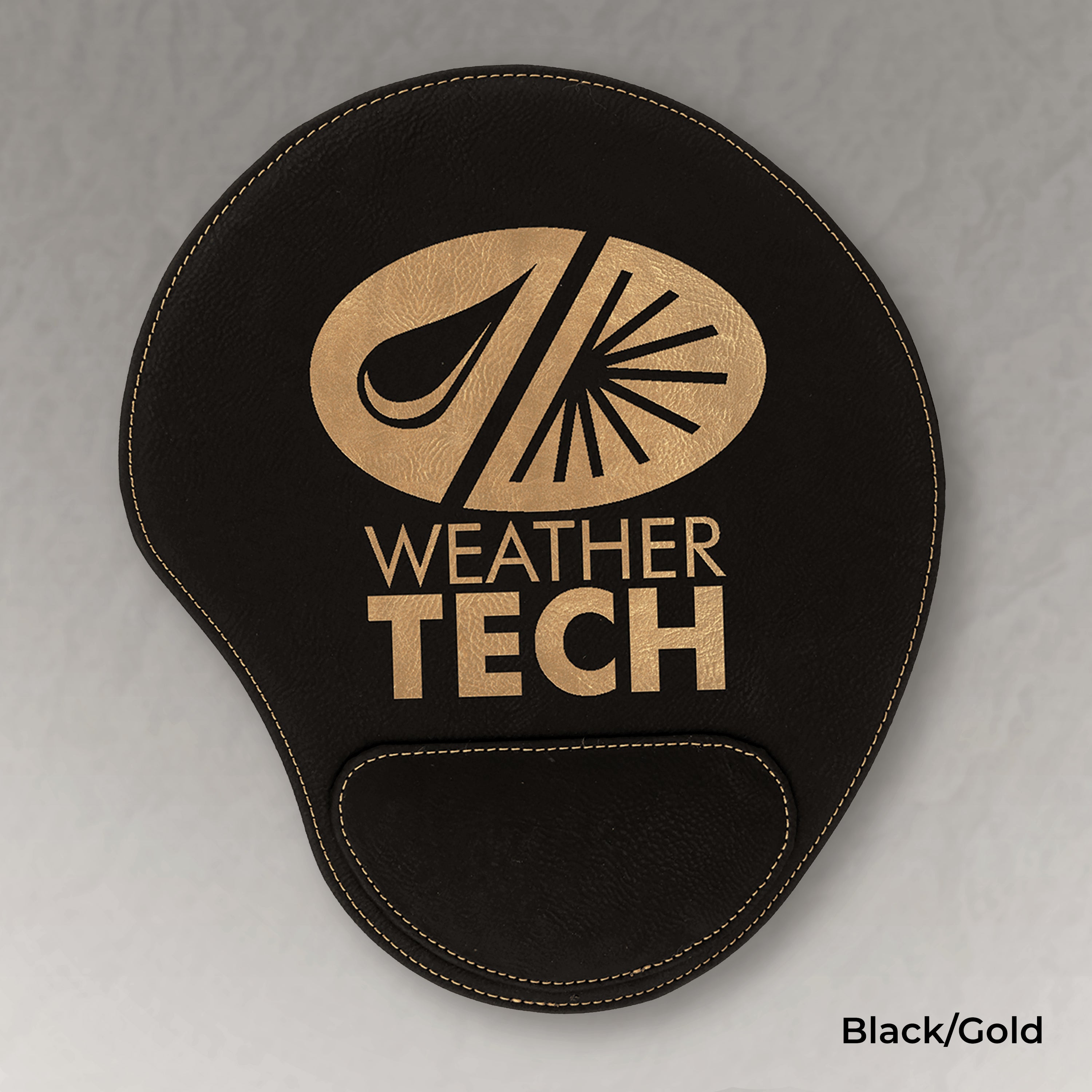Black wrist rest with Weather Tech logo on a gray background