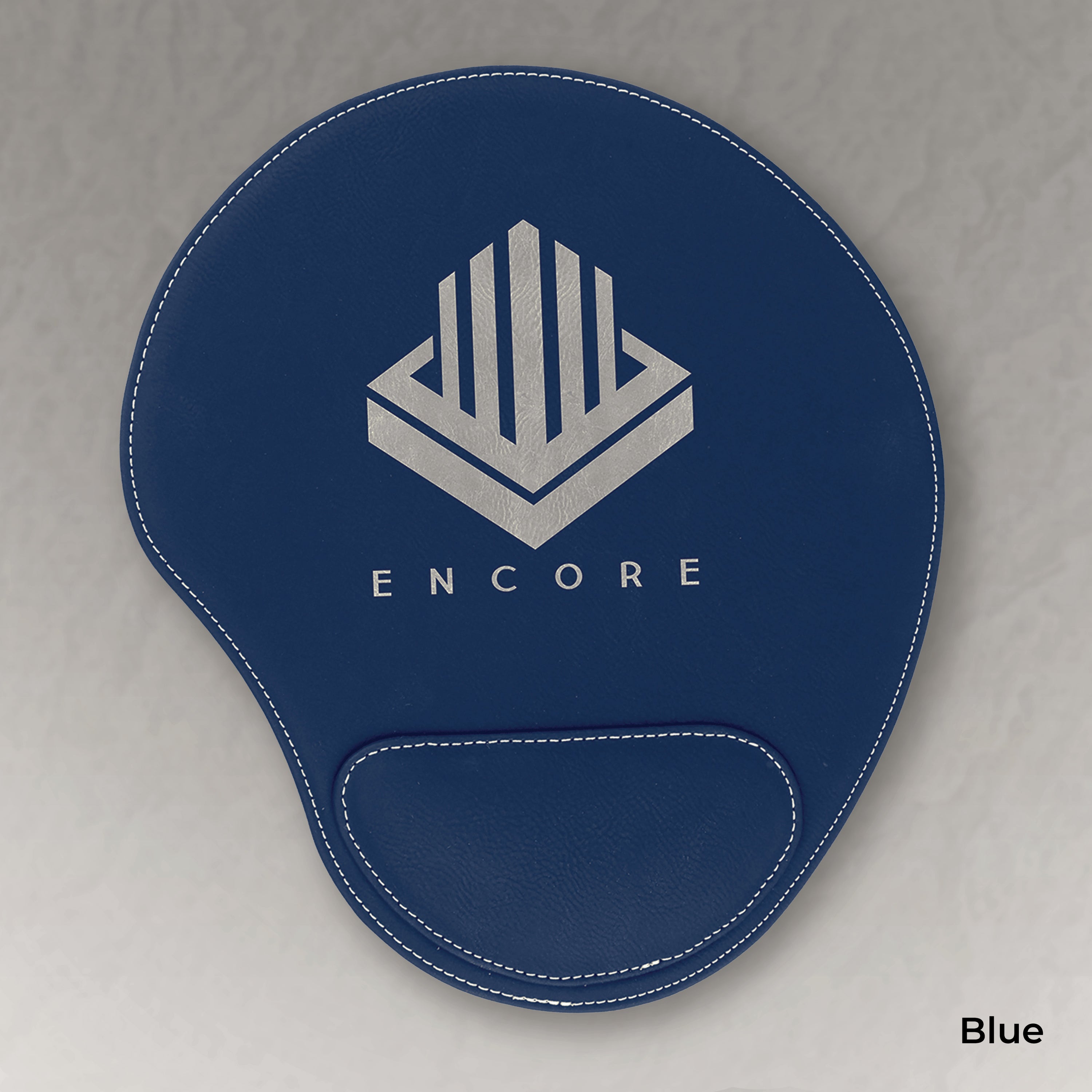 Blue wrist rest with 'Encore' logo on a gray background