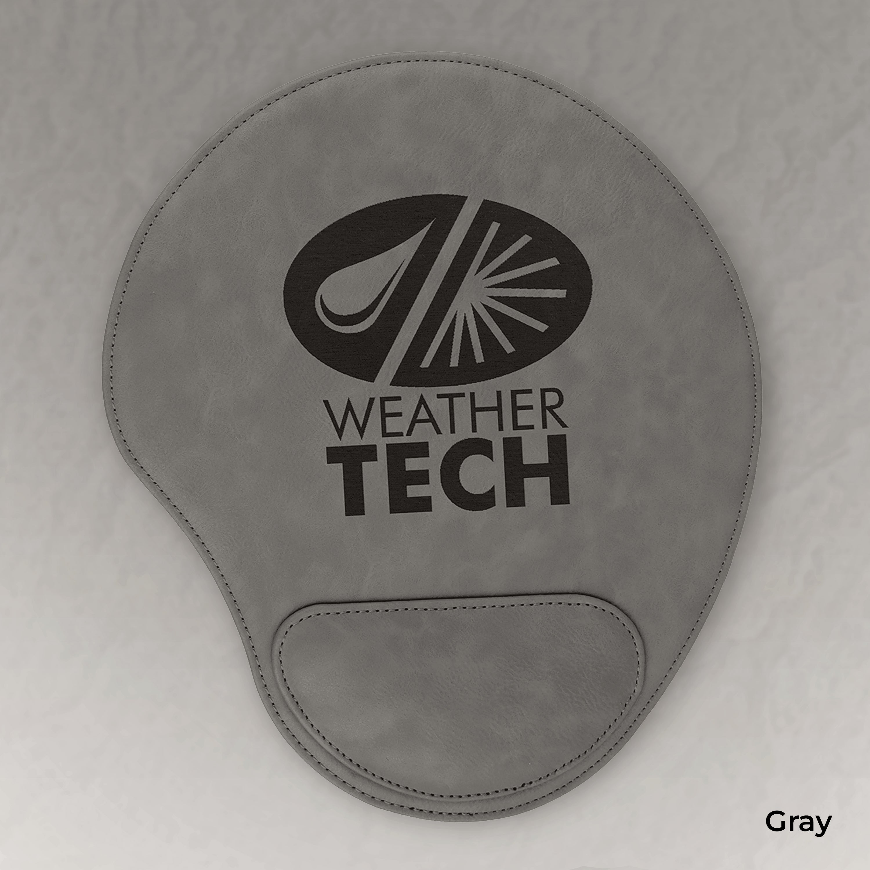 Gray wrist rest with Weather Tech logo on a light gray background