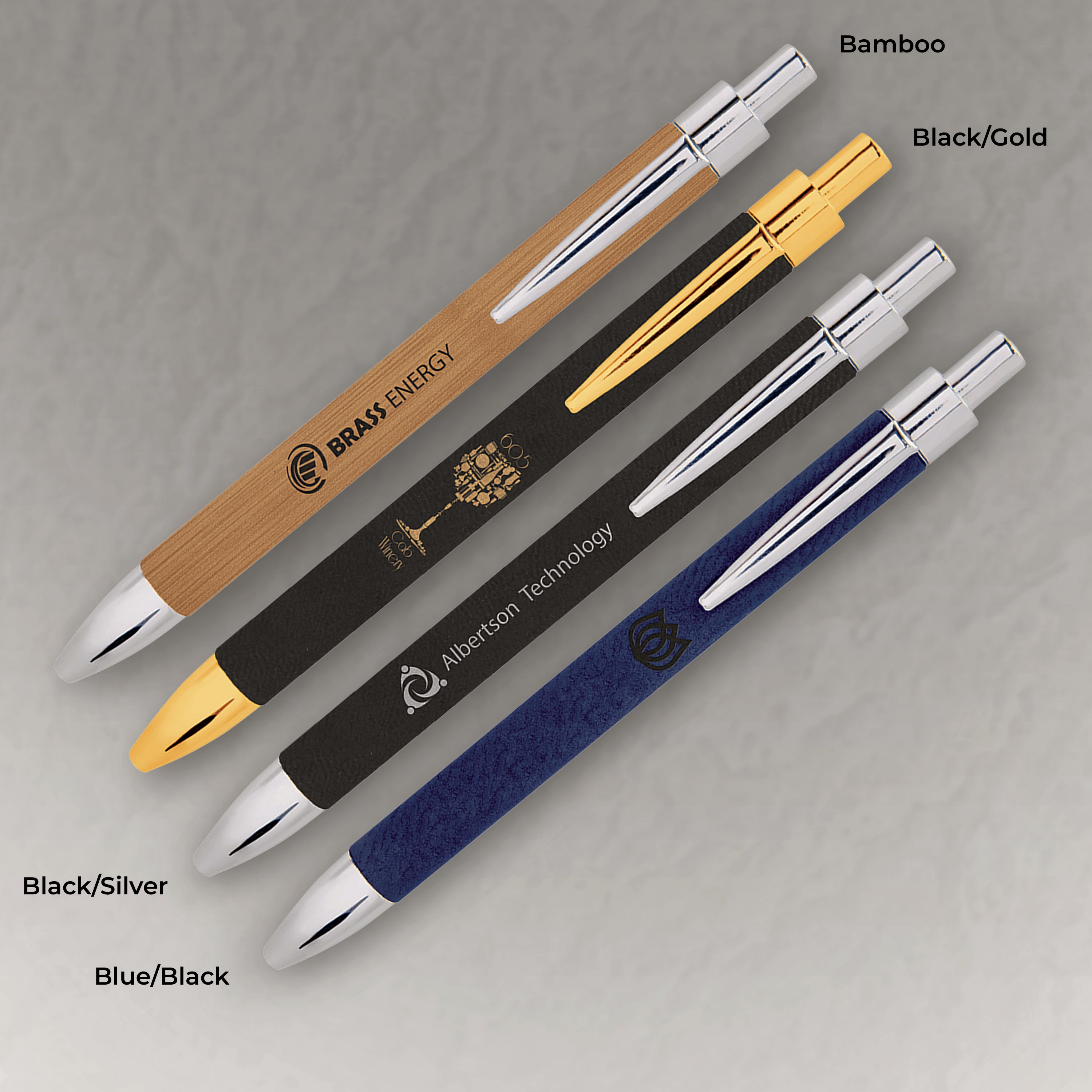 Set of pens with different color combinations and branding on a gray background