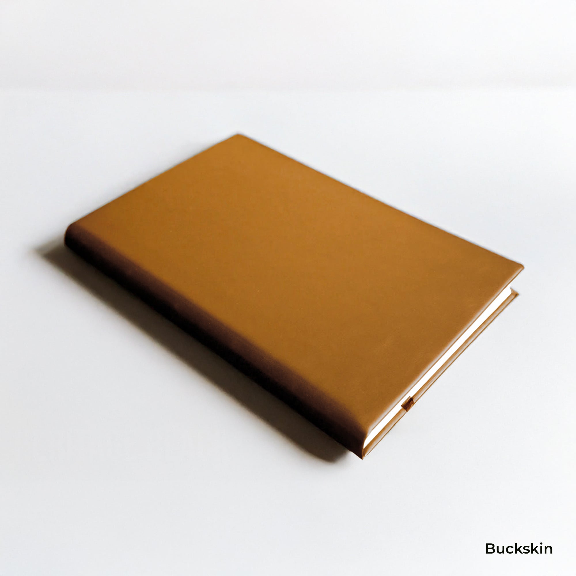 Brown leather notebook on a white background