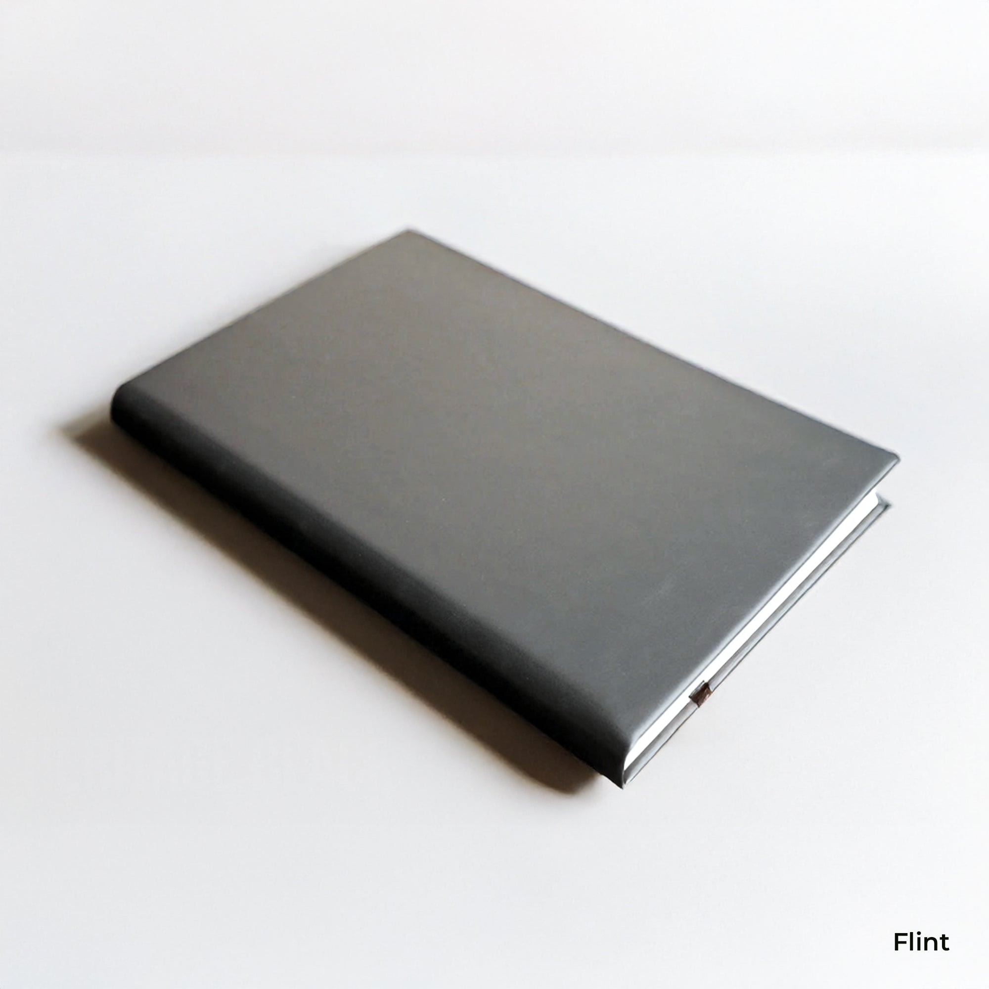 Black notebook on a white background