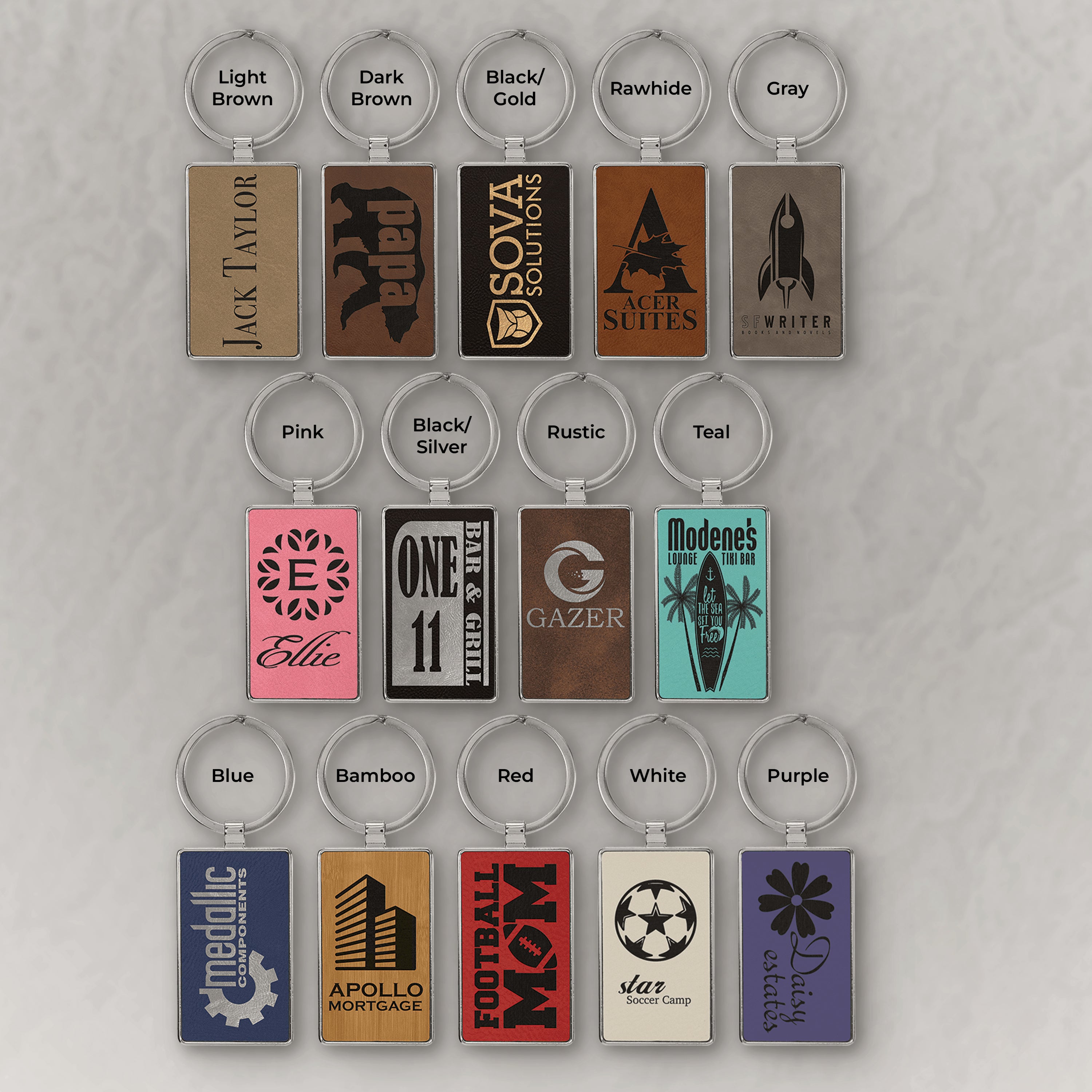 Collection of customizable keychains with various designs and colors on a gray background