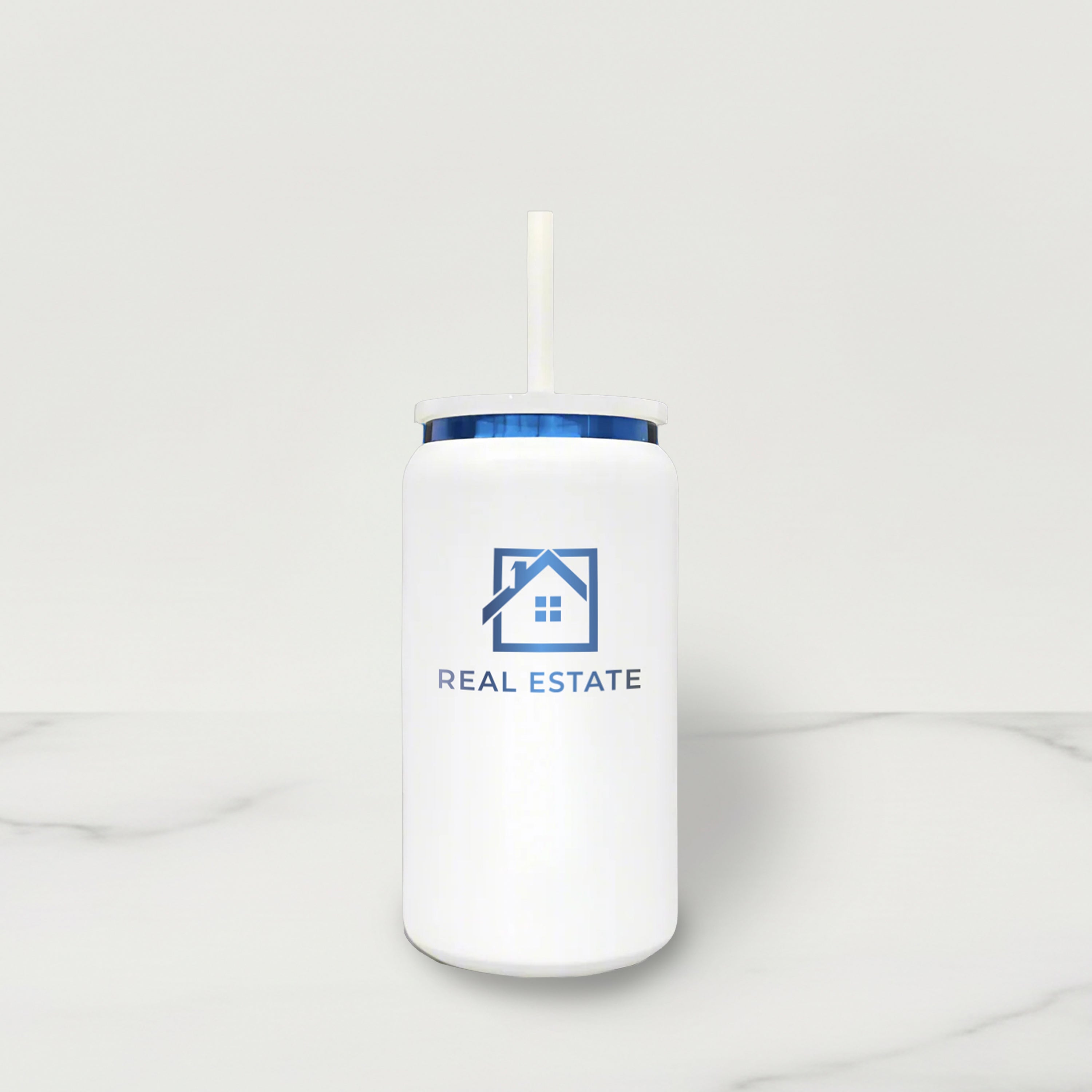 White tumbler with blue rim and real estate logo on a white background