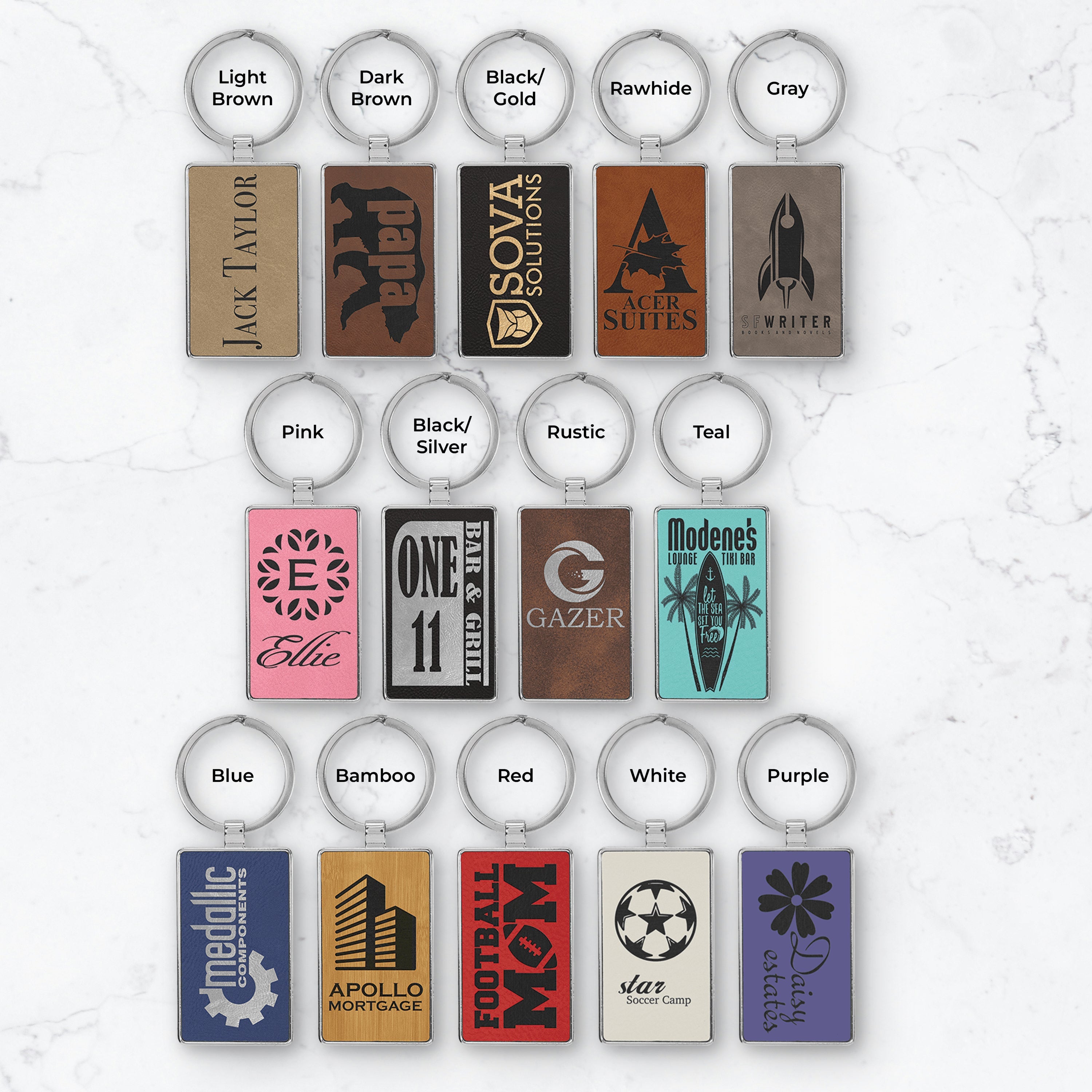 Collection of keychains with various designs and colors on a white background