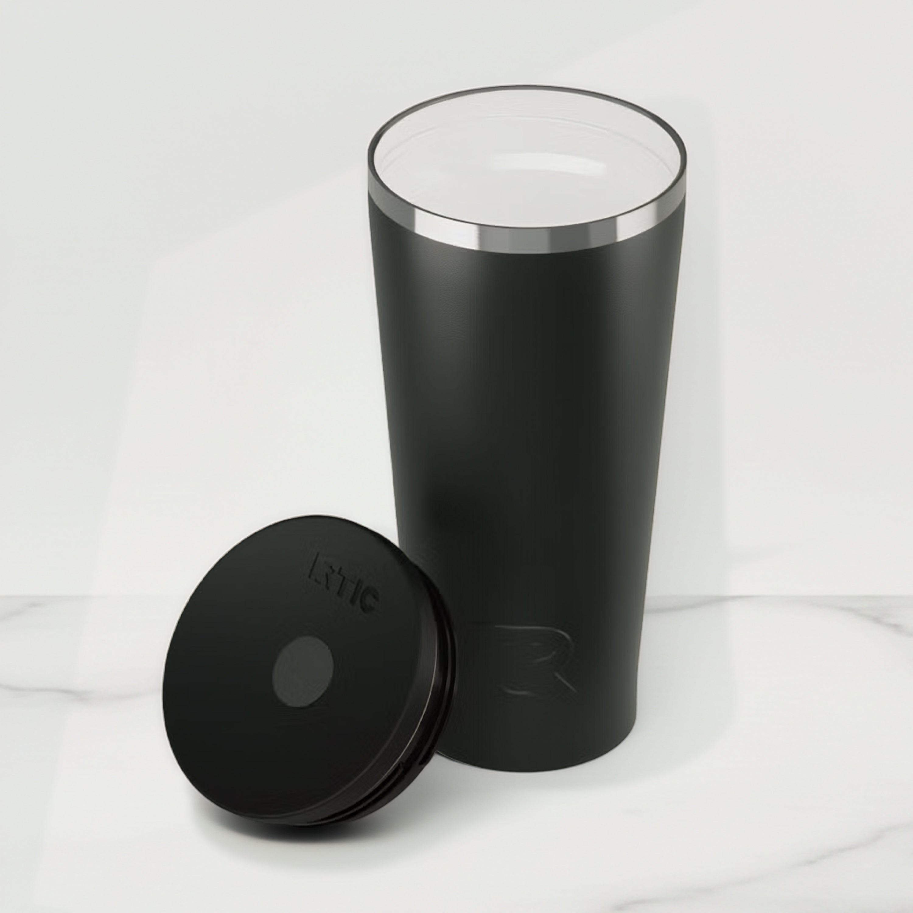 Black insulated tumbler with a lid on a white background