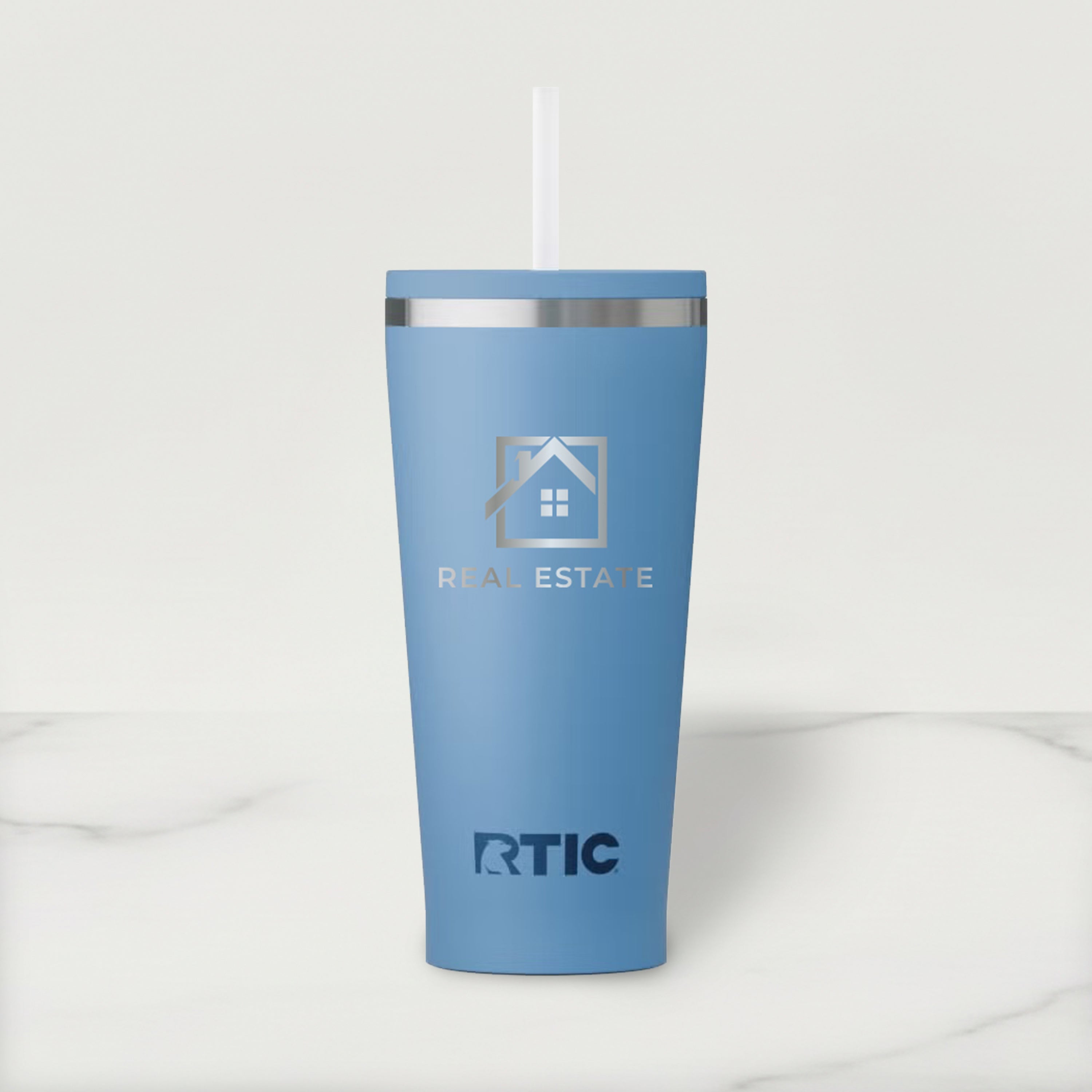 Blue RTIC tumbler with a logo on a white background