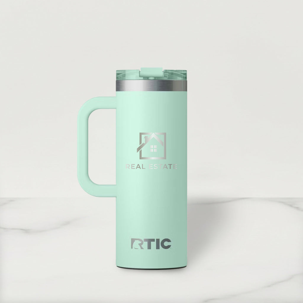 Mint green RTIC mug with handle on a light gray background