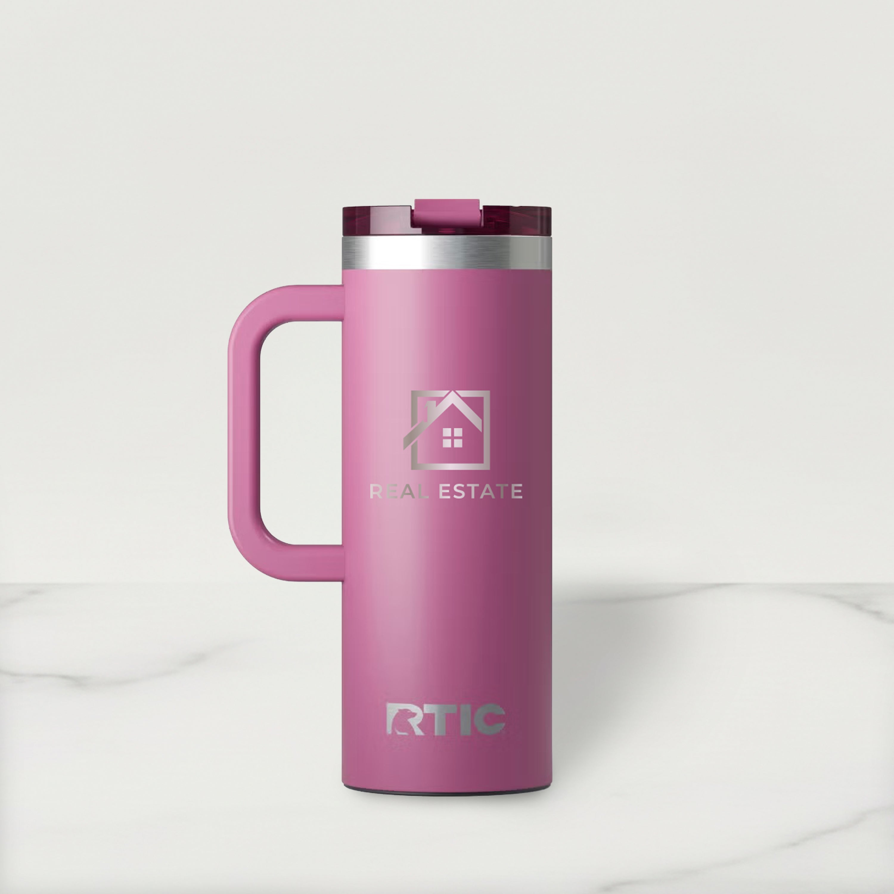 Pink RTIC mug with a handle on a white background