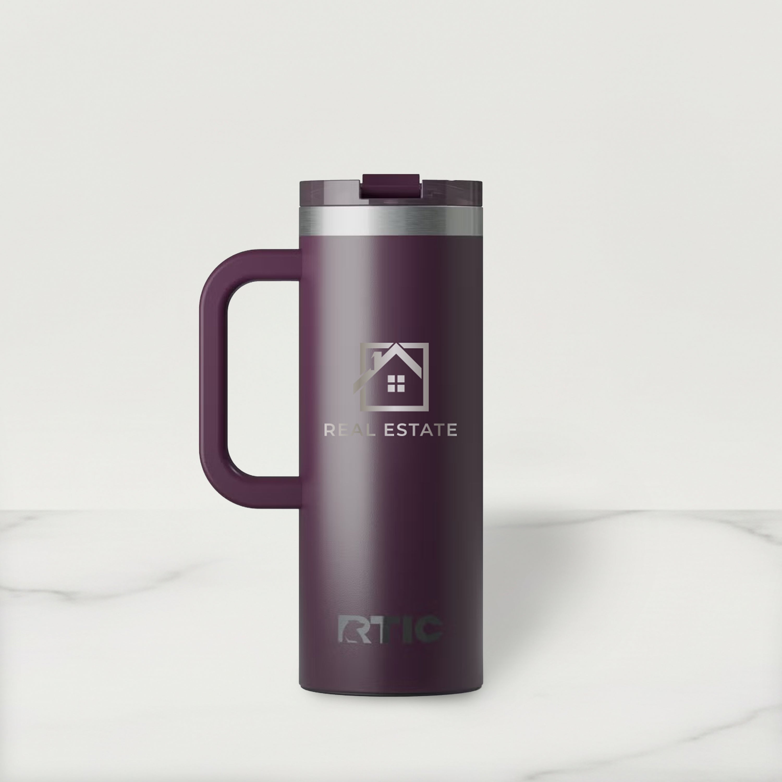 Plum RTIC mug with Real Estate logo on a white background