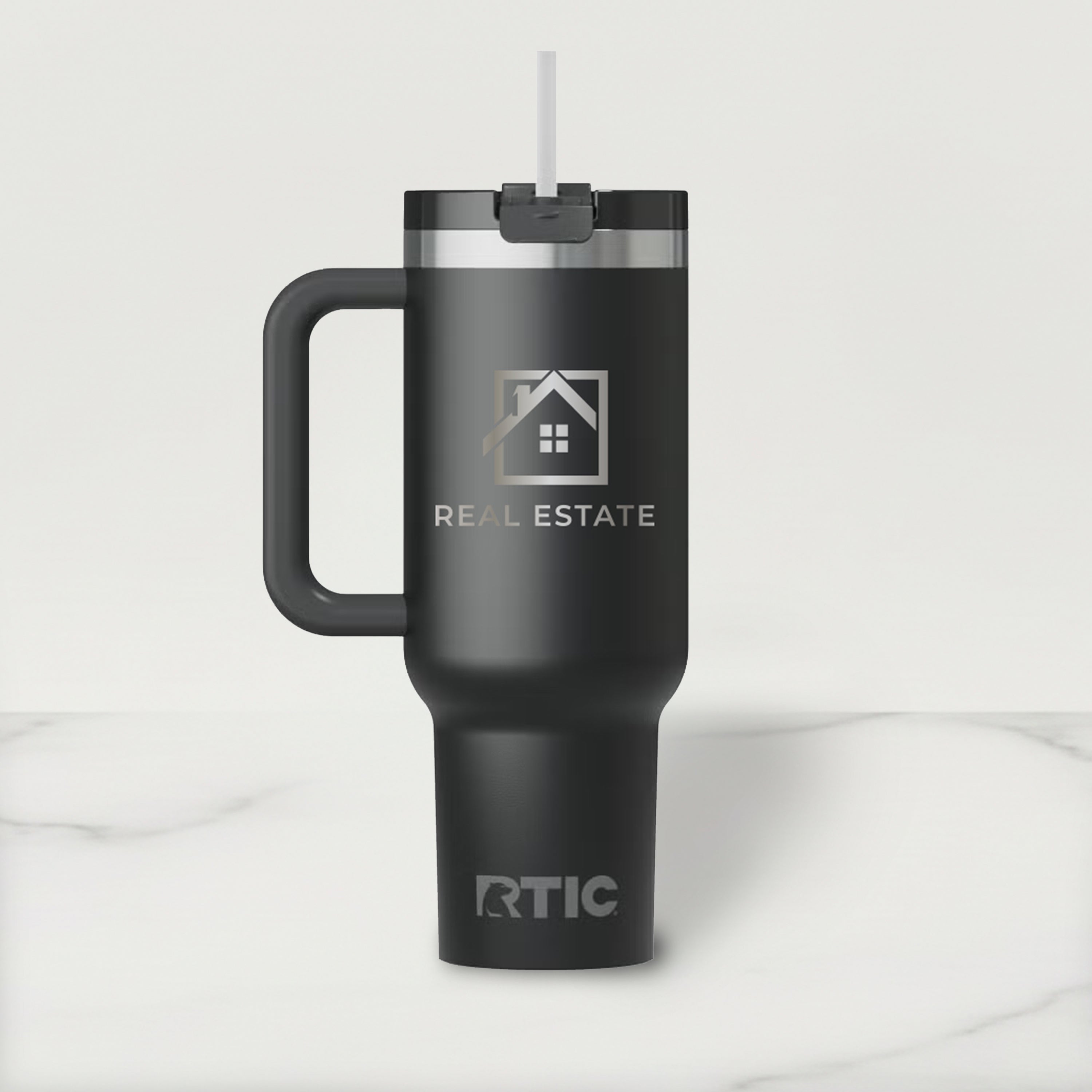 Black RTIC travel mug with a handle on a white background