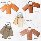 Set of leather keychains in different colors on a light background