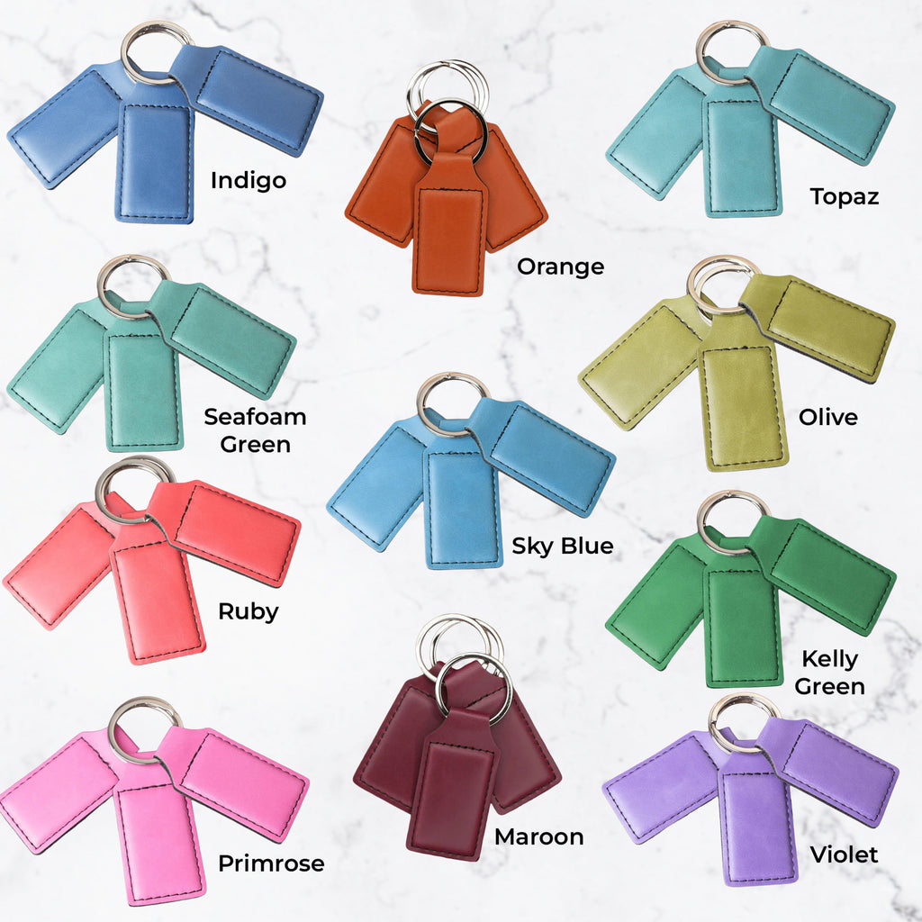 Colorful keychains in various shades with labels on a white background