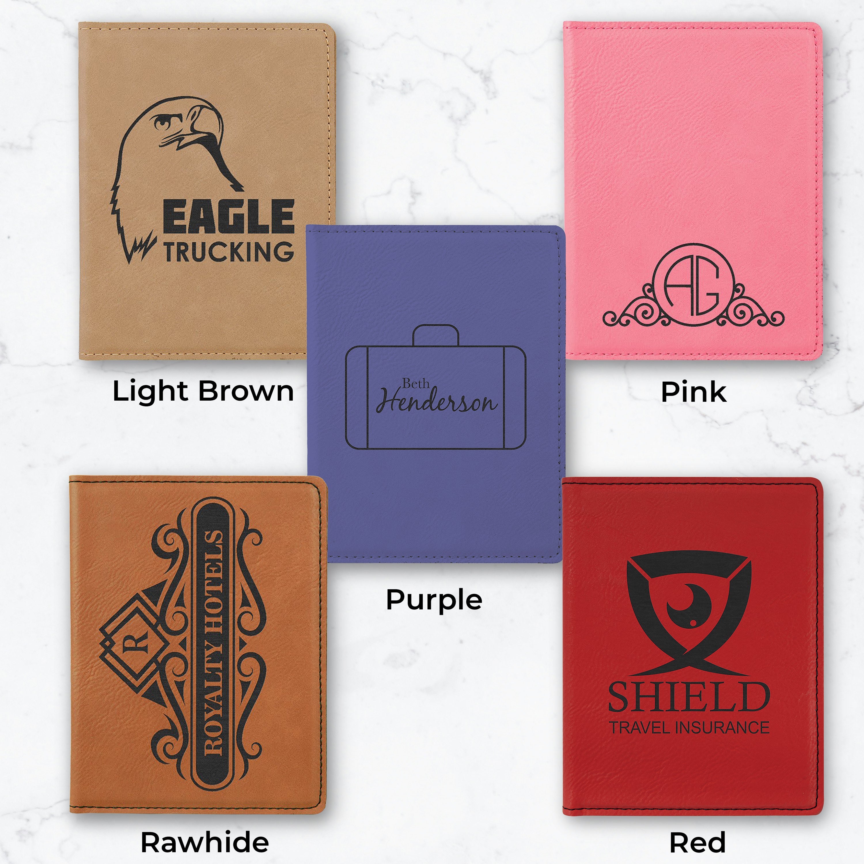 Five personalized leather passport holders in different colors with engraved designs and text.
