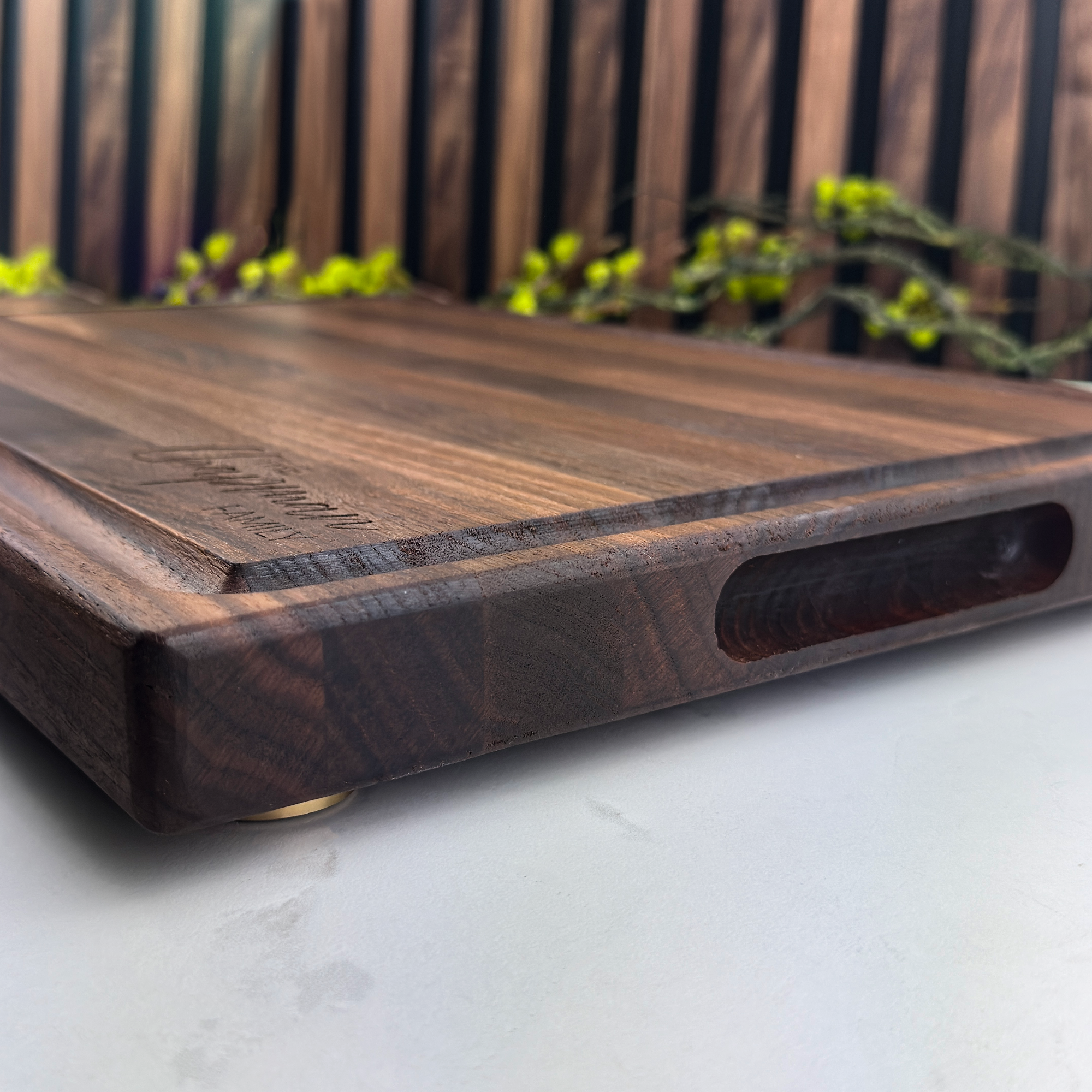 Wooden cutting board with a blurred outdoor background